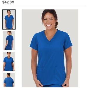 Jockey royal blue scrubs set. Pants xsp and too small. In good condition.